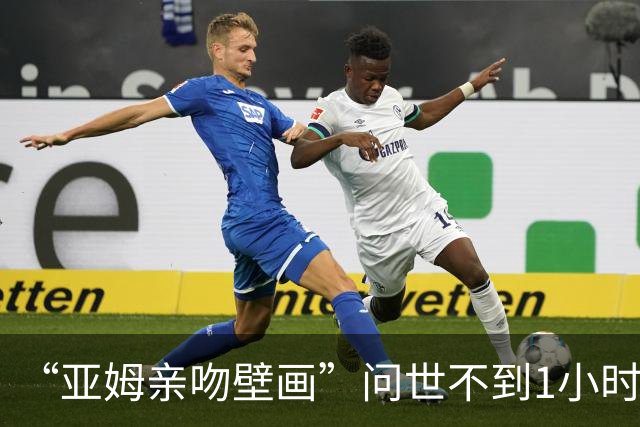 “亚姆亲吻壁画”问世不到1小时便被破坏!艺术家：这更证明需要它